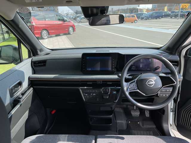 日産 サクラ X 愛知県 2023(令5)年 0.6万km ホワイトパール 純正9型ナビ/バックカメラ/コーナーセンサー/純正アルミホイール/LEDヘッドライト/オートマチックハイビーム/衝突軽減システム/フルセグ/CD DVD/Bluetooth/ステアリングスイッチ/スマートキー/プッシュスタート