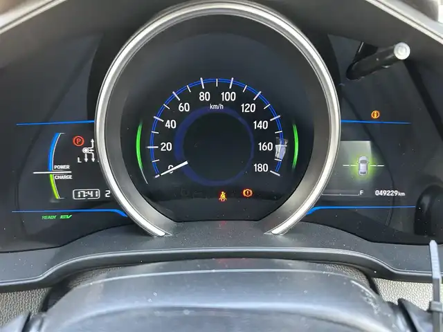 ホンダ フィット ハイブリット Fパッケージ 島根県 2016(平28)年 5万km プレミアムホワイトパールⅡ 純正ナビ/（Bluetooth/ワンセグ/CD/DVD/SD)/バックカメラ /ETC  /LEDヘッドライト/純正フロアマット/純正15インチアルミホイール /横滑り防止装置 /電動格納式ミラー/ISOFIX