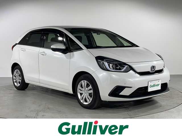 ホンダ フィット e:HEVホーム 福岡県 2022(令4)年 0.9万km プラチナホワイトパール ・フルセグTV/・ACC/・CD/DVD/・ブレーキホールド/・Bカメラ/・前後ドラレコ/・プッシュスタート/・ETC/・Bluetooth/・AM/FM