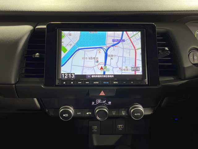 ホンダ フィット e:HEVホーム 福岡県 2022(令4)年 0.9万km プラチナホワイトパール ・フルセグTV/・ACC/・CD/DVD/・ブレーキホールド/・Bカメラ/・前後ドラレコ/・プッシュスタート/・ETC/・Bluetooth/・AM/FM