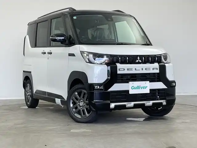 三菱 デリカミニ T プレミアム 新潟県 2025(令7)年 0.1千km アメジストブラック/シルキーホワイト 4WD/プロパイロット/純正ディスプレイオーディオ/　AppleCarPlay/AndroidAuto/Bluetooth/HDMI/全方位モニター/両側パワースライドドア/衝突被害軽減ブレーキ/レーンキープアシスト/前後コーナーセンサー/レーダークルーズコントロール/ハーフレザーシート/前席シートヒーター/オートマチックハイビーム/LEDヘッドライト/オートライト/ステアリングヒーター/パドルシフト/禁煙車