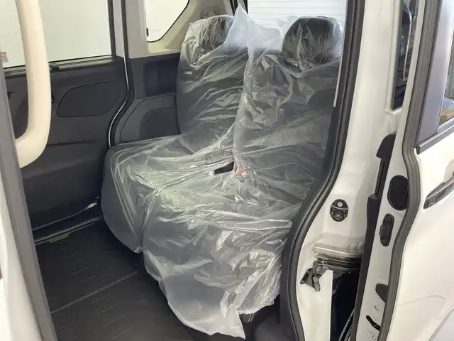 三菱 デリカミニ T プレミアム 新潟県 2025(令7)年 0.1千km アメジストブラック/シルキーホワイト 4WD/プロパイロット/純正ディスプレイオーディオ/　AppleCarPlay/AndroidAuto/Bluetooth/HDMI/全方位モニター/両側パワースライドドア/衝突被害軽減ブレーキ/レーンキープアシスト/前後コーナーセンサー/レーダークルーズコントロール/ハーフレザーシート/前席シートヒーター/オートマチックハイビーム/LEDヘッドライト/オートライト/ステアリングヒーター/パドルシフト/禁煙車