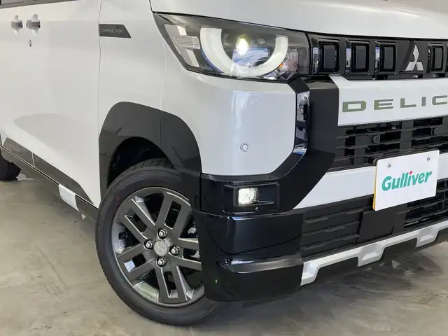 三菱 デリカミニ T プレミアム 新潟県 2025(令7)年 0.1千km アメジストブラック/シルキーホワイト 4WD/プロパイロット/純正ディスプレイオーディオ/　AppleCarPlay/AndroidAuto/Bluetooth/HDMI/全方位モニター/両側パワースライドドア/衝突被害軽減ブレーキ/レーンキープアシスト/前後コーナーセンサー/レーダークルーズコントロール/ハーフレザーシート/前席シートヒーター/オートマチックハイビーム/LEDヘッドライト/オートライト/ステアリングヒーター/パドルシフト/禁煙車