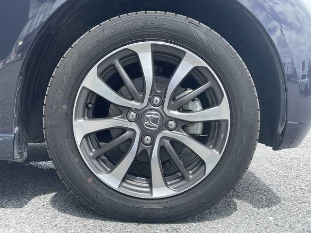 ホンダ Ｎ ＢＯＸ カスタム 滋賀県 2024(令6)年 2.9万km トワイライトミストブラックパール 純正8インチナビ（VXM-245ZFEi）/(AM/FM/BT/iPod/USB/フルセグTV)/片側パワースライドドア/コーナーセンサー/ホンダセンシング/衝突軽減ブレーキ/レーントレーシングアシスト/レーダークルーズコントロール/バックカメラ/ビルトインETC/前後ドライブレコーダー/シートヒーター(D/N)/ステアリングスイッチ/電動サイドブレーキ/オートライト/プッシュスタート/純正フロアマット/ドアバイザー/電格ウインカーミラー