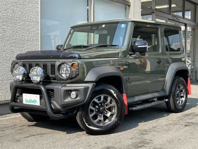 スズキ ジムニー シエラ JC 大阪府 2022(令4)年 1.4万km ジャングルグリーン ワンオーナー/IPFオフロードランプ/CARSTYLEサイドダクトプロテクター/純正８インチSDナビ/（フルセグ／ＢＴ／ＣＤ／ＤＶＤ）/バックカメラ/クルーズコントロール/レーンキープアシスト/衝突被害軽減システム/横滑り防止装置/ダウンヒルアシストコントロール/ヒーテッドドアミラー/前席シートヒーター/純正15インチAW/前後ドライブレコーダー/ETC/保証書/取扱説明書