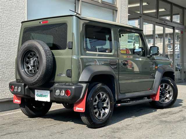 スズキ ジムニー シエラ JC 大阪府 2022(令4)年 1.4万km ジャングルグリーン ワンオーナー/IPFオフロードランプ/CARSTYLEサイドダクトプロテクター/純正８インチSDナビ/（フルセグ／ＢＴ／ＣＤ／ＤＶＤ）/バックカメラ/クルーズコントロール/レーンキープアシスト/衝突被害軽減システム/横滑り防止装置/ダウンヒルアシストコントロール/ヒーテッドドアミラー/前席シートヒーター/純正15インチAW/前後ドライブレコーダー/ETC/保証書/取扱説明書