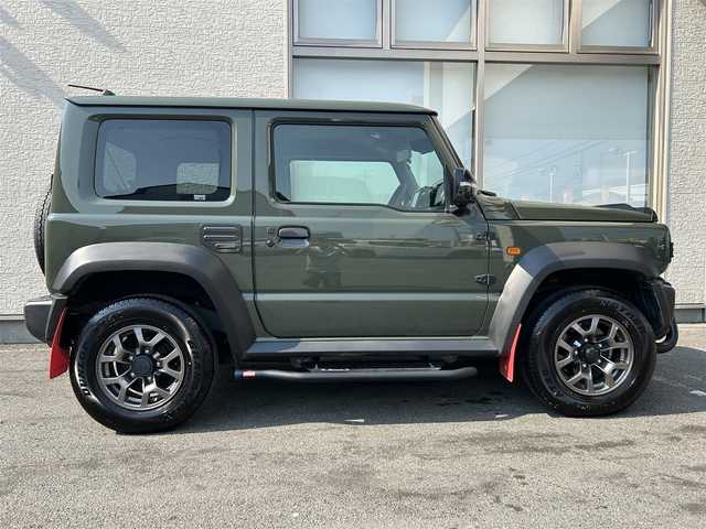 スズキ ジムニー シエラ JC 大阪府 2022(令4)年 1.4万km ジャングルグリーン ワンオーナー/IPFオフロードランプ/CARSTYLEサイドダクトプロテクター/純正８インチSDナビ/（フルセグ／ＢＴ／ＣＤ／ＤＶＤ）/バックカメラ/クルーズコントロール/レーンキープアシスト/衝突被害軽減システム/横滑り防止装置/ダウンヒルアシストコントロール/ヒーテッドドアミラー/前席シートヒーター/純正15インチAW/前後ドライブレコーダー/ETC/保証書/取扱説明書