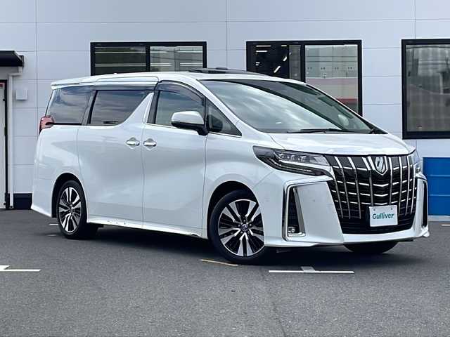 トヨタ アルファード S Cパッケージ 山口県 2023(令5)年 1.5万km ホワイトパールクリスタルシャイン サンルーフ/純正12.1インチフリップダウンモニター/JBLプレミアムサウンド/ワンオーナー/純正10.5インチナビ/・Bluetooth/・フルセグテレビ/・CD/DVDキット/パノラミックビューモニター/ドライブレコーダー/ビルトインETC/Toyota Safety Sense/・プリクラッシュセーフティシステム/・レーントレーシングアシスト/・ロードサインアシスト/・レーダークルーズコントロール/・先行車発進告知機能/・ブラインドスポットモニター/・クリアランスソナー/・パーキングサポートブレーキ/インテリジェントルームミラー/オートハイビーム/3眼LEDヘッドライト/オットマン/パワーバックドア/USB入力端子/AC100V/レザーシート/全席パワーシート/シートヒーター/エアシート/スマートキー/プッシュスタート/スペアキー1本/ステアリングヒーター/両側パワースライドドア/純正18インチアルミホイール/ドアバイザー/ウィンカーミラー/保証書