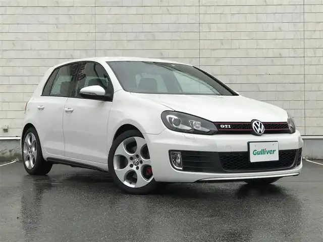 フォルクスワーゲン ゴルフ GTi 富山県 2010(平22)年 6.7万km 白 純正ナビ/Bluetooth/バックカメラ/CD/スタッドレス積込/オートライト/MTモード付/ETC/盗難防止機能/横滑り防止機能/純正フロアマット