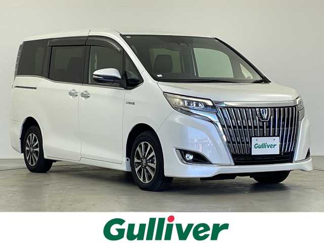 トヨタ エスクァイア ハイブリッド Gi プレミアムパッケージ 岐阜県 2019(平31)年 3.3万km ホワイトパールクリスタルシャイン ALPINＥ９インチナビ/（CD/DVD/SD/Bluetooth/HDMI）/ＡＬＰＩＮＥフリップダウンモニター/両側パワースライドドア/バックカメラ/クルーズコントロール/前席シートヒーター/ステアリングヒーター/ステアリングスイッチ/オートLEDヘッドライト/ハーフレザーシート（茶色）/スマートキー