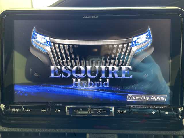 トヨタ エスクァイア ハイブリッド Gi プレミアムパッケージ 岐阜県 2019(平31)年 3.3万km ホワイトパールクリスタルシャイン ALPINＥ９インチナビ/（CD/DVD/SD/Bluetooth/HDMI）/ＡＬＰＩＮＥフリップダウンモニター/両側パワースライドドア/バックカメラ/クルーズコントロール/前席シートヒーター/ステアリングヒーター/ステアリングスイッチ/オートLEDヘッドライト/ハーフレザーシート（茶色）/スマートキー