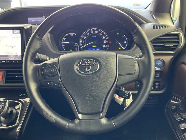 トヨタ エスクァイア ハイブリッド Gi プレミアムパッケージ 岐阜県 2019(平31)年 3.3万km ホワイトパールクリスタルシャイン ALPINＥ９インチナビ/（CD/DVD/SD/Bluetooth/HDMI）/ＡＬＰＩＮＥフリップダウンモニター/両側パワースライドドア/バックカメラ/クルーズコントロール/前席シートヒーター/ステアリングヒーター/ステアリングスイッチ/オートLEDヘッドライト/ハーフレザーシート（茶色）/スマートキー