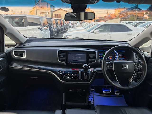 ホンダ オデッセイ ハイブリッド アブソルートセンシングEXパック 大阪府 2017(平29)年 6.9万km プレミアムヴィーナスブラックP フリップダウンモニター/純正ナビ/フルセグ/バックカメラ/ブラインドスポットモニター/ホンダセンシング/両側パワースライドドア/シートヒーター/オットマンチェア/レザーシート/LEDヘッドライト/ビルトインETC/AC100V/革巻きステアリング/スマートキー×2