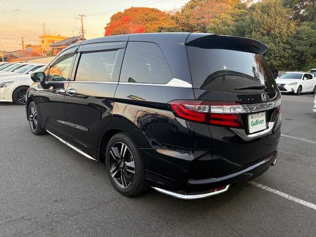 ホンダ オデッセイ ハイブリッド アブソルートセンシングEXパック 大阪府 2017(平29)年 6.9万km プレミアムヴィーナスブラックP フリップダウンモニター/純正ナビ/フルセグ/バックカメラ/ブラインドスポットモニター/ホンダセンシング/両側パワースライドドア/シートヒーター/オットマンチェア/レザーシート/LEDヘッドライト/ビルトインETC/AC100V/革巻きステアリング/スマートキー×2