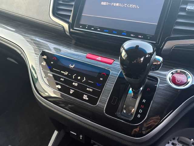 ホンダ オデッセイ ハイブリッド アブソルートセンシングEXパック 大阪府 2017(平29)年 6.9万km プレミアムヴィーナスブラックP フリップダウンモニター/純正ナビ/フルセグ/バックカメラ/ブラインドスポットモニター/ホンダセンシング/両側パワースライドドア/シートヒーター/オットマンチェア/レザーシート/LEDヘッドライト/ビルトインETC/AC100V/革巻きステアリング/スマートキー×2