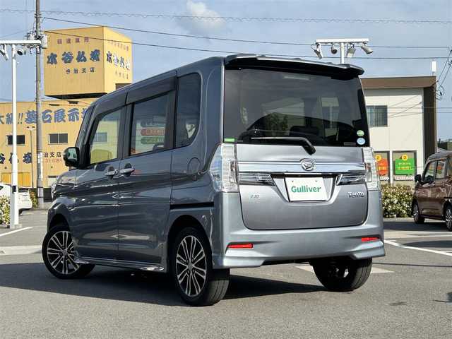ダイハツ タント カスタム RS トップED SA 愛媛県 2014(平26)年 9.6万km タングステングレーM 禁煙車/登録時走行距離：95826km/ディーラーオプション純正ナビ/CD/DVD/ワンセグTV/バックカメラ/社外ETC/衝突被害軽減システム/横滑り防止装置/LEDヘッドライト/フォグランプ/オートライト/オートマチックハイビーム/両側パワースライドドア/エンジンスタートボタン/スマートキー/純正フロアマット
