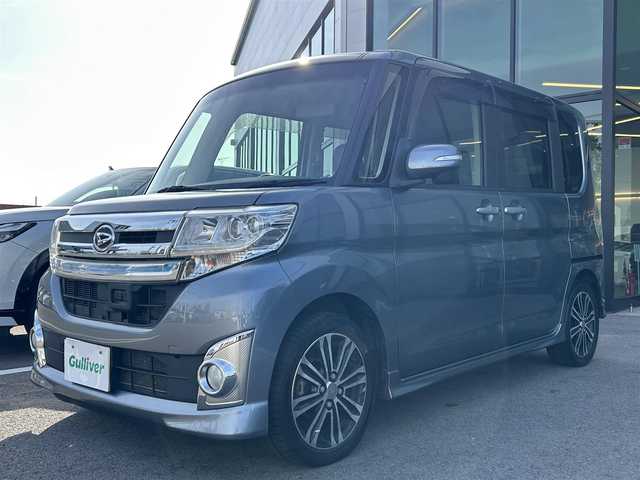 ダイハツ タント カスタム RS トップED SA 愛媛県 2014(平26)年 9.6万km タングステングレーM 禁煙車/登録時走行距離：95826km/ディーラーオプション純正ナビ/CD/DVD/ワンセグTV/バックカメラ/社外ETC/衝突被害軽減システム/横滑り防止装置/LEDヘッドライト/フォグランプ/オートライト/オートマチックハイビーム/両側パワースライドドア/エンジンスタートボタン/スマートキー/純正フロアマット