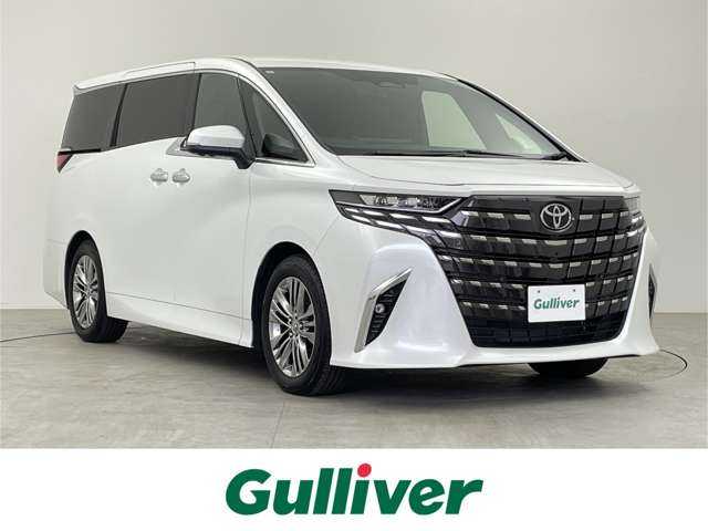 トヨタ アルファード Z 千葉県 2024(令6)年 1.3万km プラチナホワイトパールマイカ 禁煙車/両側電動ドア/パワーバックドア/左右独立ムーンルーフ/JBLサウンドシステム/トヨタセーフティセンス/・レーンディパーチャーアラート/・レーンキープアシスト/・ブラインドスポットモニター/・プリクラッシュセーフティ/・プリクラッシュセーフティブレーキ/・クリアランスソナー/・レーダークルーズコントロール/純正14インチディスプレイオーディオ/・コネクティッドナビ付き/・Bluetooth/フルセグTV/・TVキャンセラー/・パノラミックビューモニター/・ビルトインETC2.0/・デジタルインナーミラー/左右独立エアコン/置くだけ充電/スモークフィルム/革巻きステアリング/・ステアリングスイッチ/・ステアリングヒーター/レザーシート/・D席メモリ付き/・DNセカンドパワーシート/・DNセカンドシートヒーター/・DNセカンドエアーシート/・オットマン/電子パーキング/・ブレーキホールド/オートライト/・オートマチックハイビーム/・三眼LEDヘッドライト/・LEDフォグランプ/・シーケンシャルウインカー/純正フロアマット/純正18インチAW