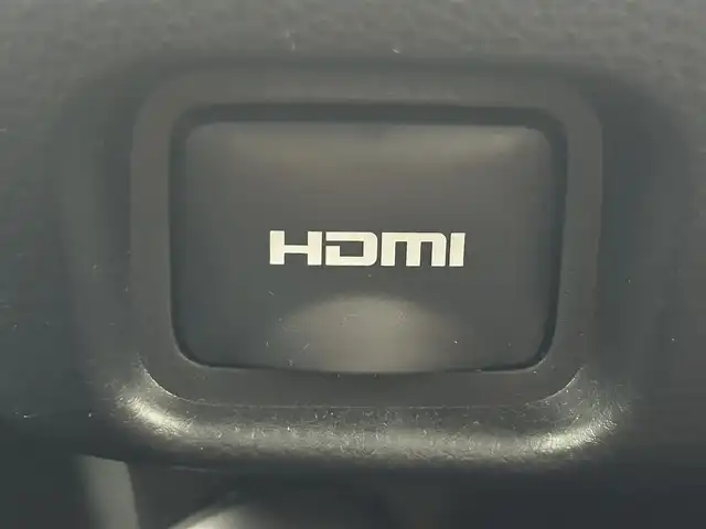 トヨタ ヴォクシー ハイブリッド S－Z 岡山県 2024(令6)年 1.9万km グリッターブラックガラスフレーク 快適利便パッケージ/ハーフレザーシート/純正10.5インチディスプレイオーディオ/　「ナビ/フルセグ/Bluetooth/DVD/ Carplay」/ブラインドスポットモニター/バックカメラ/ユニバーサルステップ（左回りのみ）/追従型クルーズコントロール/オートハイビーム/LEDヘッドライト/ビルトインETC2.0/両側パワースライドドア/シートヒーター(1列目/2列目)/衝突軽減ブレーキシステム/車線逸脱防止システム/横滑り防止装置/純正17インチアルミホイール/コーナーセンサー（前後）/純正フロアマット/ステアリングスイッチ/プッシュスタート/スマートキー×1