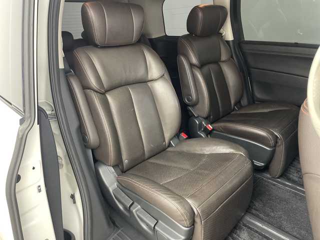 日産 エルグランド 350ハイウェイスター プレミアム 兵庫県 2011(平23)年 6.8万km ブリリアントホワイトパール ・アルパイン製8型ナビ＆フルセグ＆BT＆DVD/・アルパイン製10.2型フリップダウンモニター/・バックカメラ/・両側パワースライドドア/・革シート/・前席シートヒーター/・前席パワーシート/・パワーバックドア/・TEIN車高調/・社外20インチアルミホイール/・スマートキー/・プッシュスタート/・ETC/・LEDヘッドライト/・オートライト/・フロアマット/・横滑り防止装置