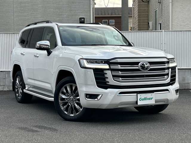 トヨタ ランドクルーザー ZX 栃木県 2024(令6)年 0.4万km プレシャスホワイトパール サンルーフ/リヤエンターテインメントシステム/JBLプレミアムサウンド/寒冷地仕様/ルーフレール/本革シート/クールボックス/電動リヤデフロック/タイヤ空気圧警報システム/パノラミックビューモニター/マルチテレインモニター/純正20inAW