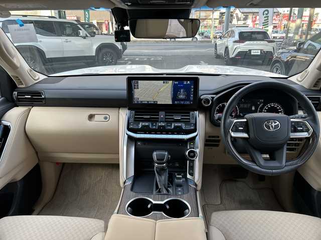 トヨタ ランドクルーザー ZX 栃木県 2024(令6)年 0.4万km プレシャスホワイトパール サンルーフ/リヤエンターテインメントシステム/JBLプレミアムサウンド/寒冷地仕様/ルーフレール/本革シート/クールボックス/電動リヤデフロック/タイヤ空気圧警報システム/パノラミックビューモニター/マルチテレインモニター/純正20inAW