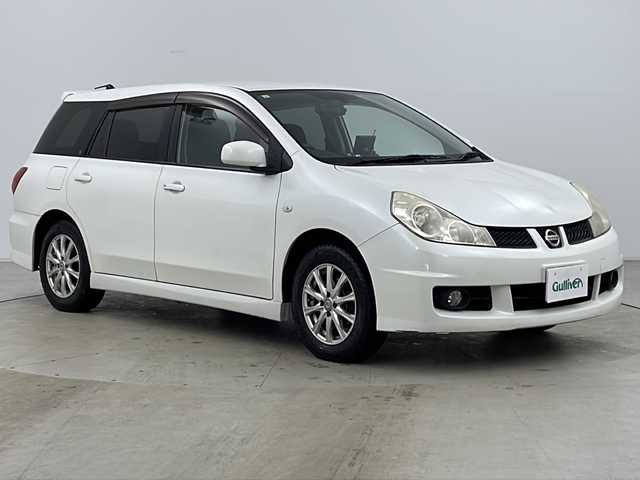日産 ウイングロード 15M FOUR 道央・札幌 2009(平21)年 13.6万km ホワイトパール ・社外パナソニックポータブルモニター/・純正オーディオ&CD/・ETC/・電動格納ミラー/・純正フロアマット/・ドアバイザー/・オートライト/・ヘッドライトレベライザー/・フォグランプ/・スマートキー/・社外エンジンスターター/・社外AW夏タイヤ積込