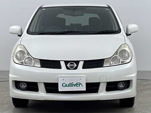 日産 ウイングロード 15M FOUR 道央・札幌 2009(平21)年 13.6万km ホワイトパール ・社外パナソニックポータブルモニター/・純正オーディオ&CD/・ETC/・電動格納ミラー/・純正フロアマット/・ドアバイザー/・オートライト/・ヘッドライトレベライザー/・フォグランプ/・スマートキー/・社外エンジンスターター/・社外AW夏タイヤ積込