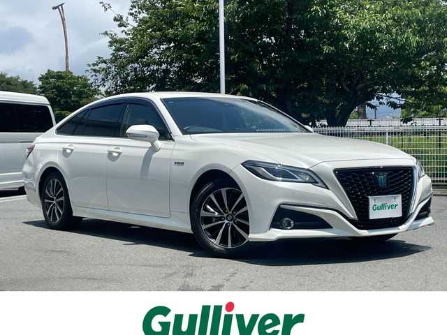 トヨタ クラウン ハイブリッド S Cパッケージ 静岡県 2018(平30)年 1.5万km ホワイトパールクリスタルシャイン トヨタセーフティセンス　/レーダークルコン　　　/純正ナビ　/地デジ　/Ｂカメラ　/ＨＵＤ　/オートホールド　/オートハイビーム　/パドルシフト　/ステアリングスイッチ　　/革巻きステアリング　/純正１７インチＡＷ/スマートキー /スペアキー /保証書/取説
