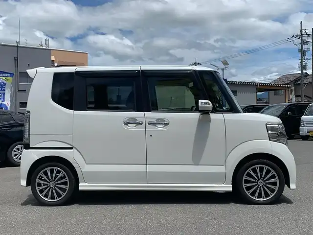 ホンダ Ｎ ＢＯＸ カスタム G ターボSSパッケージ 福井県 2014(平26)年 6万km プレミアムホワイトパール (株)IDOMが運営する【じしゃロン福井店】の自社ローン対象車両になります。こちらは現金またはオートローンご利用時の価格です。自社ローンご希望の方は別途その旨お申付け下さい/社外ナビ（CD・DVD・BT接続可）/フルセグテレビ/バックカメラ/ETC/両側パワースライドドア/クルーズコントロール/CTBA/HID/純正フロアマット