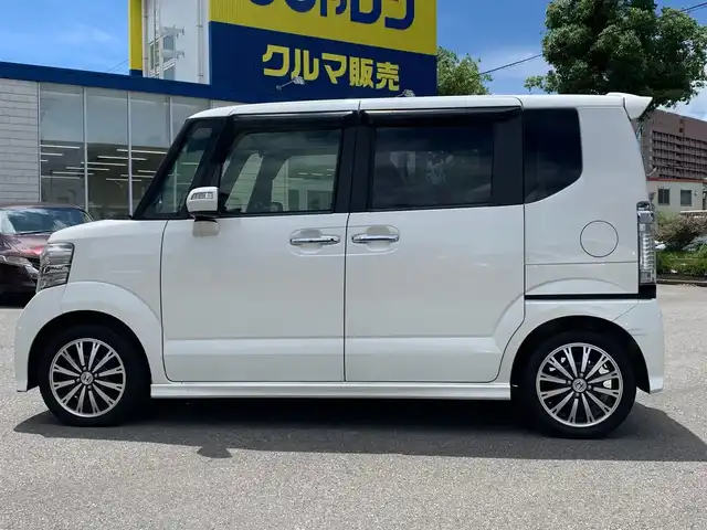 ホンダ Ｎ ＢＯＸ カスタム G ターボSSパッケージ 福井県 2014(平26)年 6万km プレミアムホワイトパール (株)IDOMが運営する【じしゃロン福井店】の自社ローン対象車両になります。こちらは現金またはオートローンご利用時の価格です。自社ローンご希望の方は別途その旨お申付け下さい/社外ナビ（CD・DVD・BT接続可）/フルセグテレビ/バックカメラ/ETC/両側パワースライドドア/クルーズコントロール/CTBA/HID/純正フロアマット