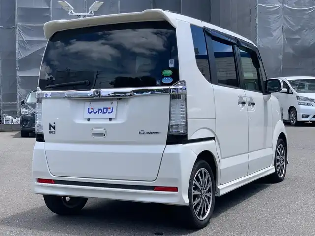 ホンダ Ｎ ＢＯＸ カスタム G ターボSSパッケージ 福井県 2014(平26)年 6万km プレミアムホワイトパール (株)IDOMが運営する【じしゃロン福井店】の自社ローン対象車両になります。こちらは現金またはオートローンご利用時の価格です。自社ローンご希望の方は別途その旨お申付け下さい/社外ナビ（CD・DVD・BT接続可）/フルセグテレビ/バックカメラ/ETC/両側パワースライドドア/クルーズコントロール/CTBA/HID/純正フロアマット