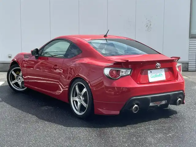 トヨタ ８６ GT リミテッド 三重県 2012(平24)年 13.9万km ライトニングレッド 6速MT/車高調（BLITZ）/フロントエアロ（トラスト）/リアエアロ/リアスポイラー/社外ホイール(RAYS　グラムライツ57CR）/社外オーディオ（Bluetooth/AM/FM/USB）/ドライブレコーダー（前）/ETC/社外エアクリーナー/ハーフレザー/シートヒーター（運転席/助手席）/オートライト/無塗装ディフューザー付同色リアバンパー/マフラーカッター/リアスポイラー/リアフォグランプ/フロアアンダーカバー/革/アルカンターラコンビシート/ウォークイン機構（助手席）/スペアキー
