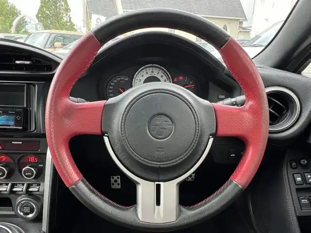 トヨタ ８６ GT リミテッド 三重県 2012(平24)年 13.9万km ライトニングレッド 6速MT/車高調（BLITZ）/フロントエアロ（トラスト）/リアエアロ/リアスポイラー/社外ホイール(RAYS　グラムライツ57CR）/社外オーディオ（Bluetooth/AM/FM/USB）/ドライブレコーダー（前）/ETC/社外エアクリーナー/ハーフレザー/シートヒーター（運転席/助手席）/オートライト/無塗装ディフューザー付同色リアバンパー/マフラーカッター/リアスポイラー/リアフォグランプ/フロアアンダーカバー/革/アルカンターラコンビシート/ウォークイン機構（助手席）/スペアキー