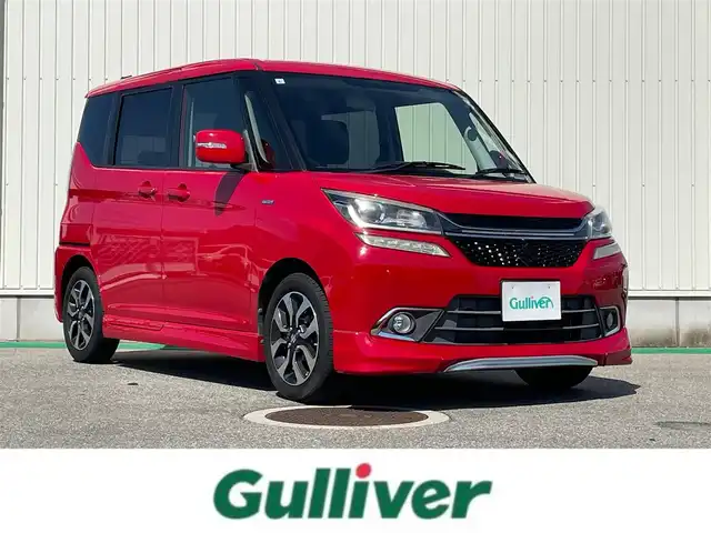 スズキ ソリオ 富山県 2017(平29)年 6.4万km ファーベントレッド 社外８インチナビ／/フルセグＴＶ／/Ｂｌｕｅｔｏｏｔｈ／/ＤＶＤ再生／/両側パワースライドドア／/スマートキー／/シートヒーター／/ＬＥＤオートライト／/フォグライト／