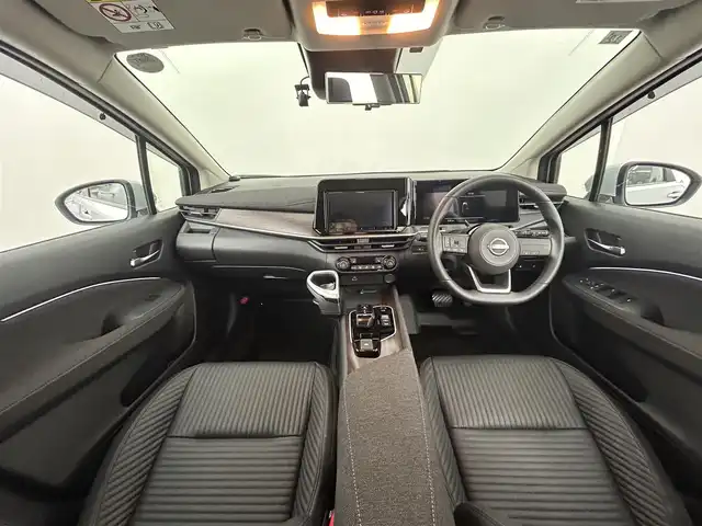 日産 オーラ G FOUR レザーエディション 道央・札幌 2023(令5)年 0.4万km ブリリアントシルバー ・４WD/・ワンオーナー/・カロッツェリア８インチナビ/　CD/DVD/SD/USB/BT/フルセグTV/・アラウンドビューモニター/・インテリジェントルームミラー/・ナビ連動ドライブレコーダー前後/・ビルトインETC/・エマージェンシーブレーキ/・レーンキープアシスト/・後側方車両検知警報（BSW）/・ブラインドスポットモニター（BSM）/・速度標識表示/・電動パーキング/・EVモード/・DRIVEモード/・ブレーキオートホールド/・レザーシート/・D+N席シートヒーター/・ステアリングヒーター/・オートマチックハイビーム/・オートライト/・LEDヘッドライト/・LEDフォグランプ/・ミラーウィンカー/・ドアバイザー/・純正フロアマット/・純正１７インチAW/・プッシュスタート/・スマートキー/・取/保