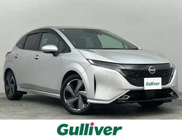 日産 オーラ G FOUR レザーエディション 道央・札幌 2023(令5)年 0.4万km ブリリアントシルバー ・４WD/・ワンオーナー/・カロッツェリア８インチナビ/　CD/DVD/SD/USB/BT/フルセグTV/・アラウンドビューモニター/・インテリジェントルームミラー/・ナビ連動ドライブレコーダー前後/・ビルトインETC/・エマージェンシーブレーキ/・レーンキープアシスト/・後側方車両検知警報（BSW）/・ブラインドスポットモニター（BSM）/・速度標識表示/・電動パーキング/・EVモード/・DRIVEモード/・ブレーキオートホールド/・レザーシート/・D+N席シートヒーター/・ステアリングヒーター/・オートマチックハイビーム/・オートライト/・LEDヘッドライト/・LEDフォグランプ/・ミラーウィンカー/・ドアバイザー/・純正フロアマット/・純正１７インチAW/・プッシュスタート/・スマートキー/・取/保
