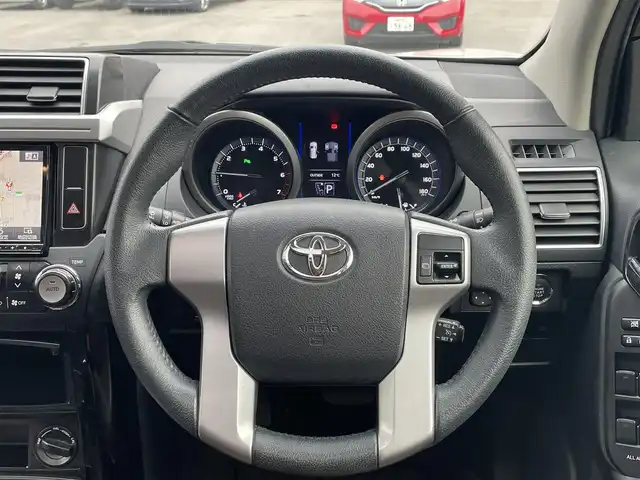 トヨタ ランドクルーザー プラド TXLパッケージ G－フロンティア 栃木県 2017(平29)年 7万km ホワイトパールクリスタルシャイン 【内装】/サンルーフ　/茶革シート　/前席パワーシート　/前席シートヒーター　/アルパイン 8型ナビ/CD/DVD/Blutooth/フルセグTV /バックカメラ　/アルパインフリップダウンモニター　/電動格納サードシート　/ドライブレコーダー/【外装】/モデリスタエアロ　/純正18インチアルミホイール　/サイドバイザー　