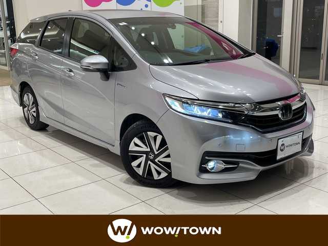 ホンダ シャトル ハイブリッド X ホンダセンシング 埼玉県 2017(平29)年 2.8万km ルナシルバーM ホンダセンシング/社外ナビ/　　CD/DVD/BD/BT/フルセグTV/バックカメラ/アダプティブクルーズコントロール/LEDオートライト/ハーフレザーシート/シートヒーター/パドルシフト/ETC/禁煙車