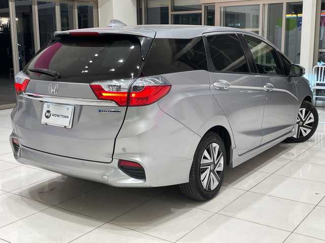 ホンダ シャトル ハイブリッド X ホンダセンシング 埼玉県 2017(平29)年 2.8万km ルナシルバーM ホンダセンシング/社外ナビ/　　CD/DVD/BD/BT/フルセグTV/バックカメラ/アダプティブクルーズコントロール/LEDオートライト/ハーフレザーシート/シートヒーター/パドルシフト/ETC/禁煙車