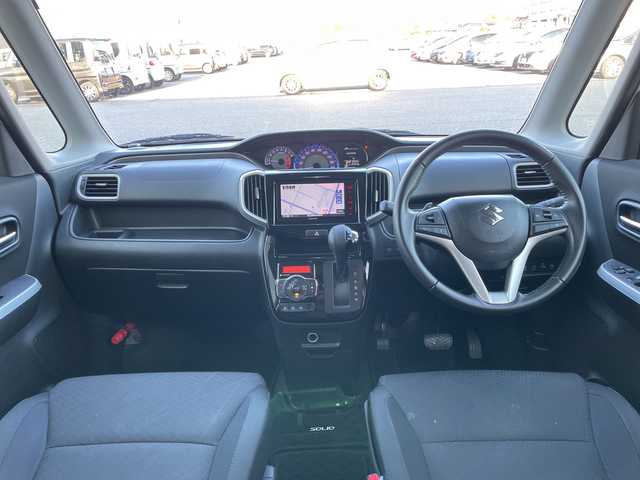 スズキ ソリオ バンディット HV MV 富山県 2020(令2)年 6.2万km ピュアホワイトP 社外ナビ（KENWOOD）/【CD/DVD/フルセグTV/BT/iPod】/両側パワースライドドア/ワンオーナー/クルーズコントロール/コーナーセンサー/パドルシフト/純正アルミホイール/電動格納ミラー/シートヒーター/スマートキー/アイドリングストップ/ETC/プッシュスタート/純正フロアマット/横滑り防止装置/盗難防止装置/レーンキープアシスト/オートマチックハイビーム