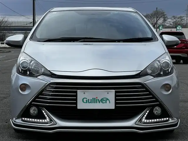 トヨタ アクア G G’s 道央・札幌 2015(平27)年 13.4万km シルバーM 寒冷地仕様/社外メモリーナビ/AM/FM/BT/CD/DVD/SD/フルセグ/横滑り防止装置/バックカメラ/ビルトインETC/ドライブレコーダー/アイドリングストップ/ワイパーデアイサー/ECOMODE/EVMODE/前席シートヒーター/ハーフレザーシート/革巻きステアリング/ステアリングリモコン/プッシュスタート/スマートキー/LEDヘッドライト/オートライト/フォグランプ/電動格納ミラー/ウィンカーミラー/純正フロアマット/ドアバイザー/スペアキー/純正エンジンスターター