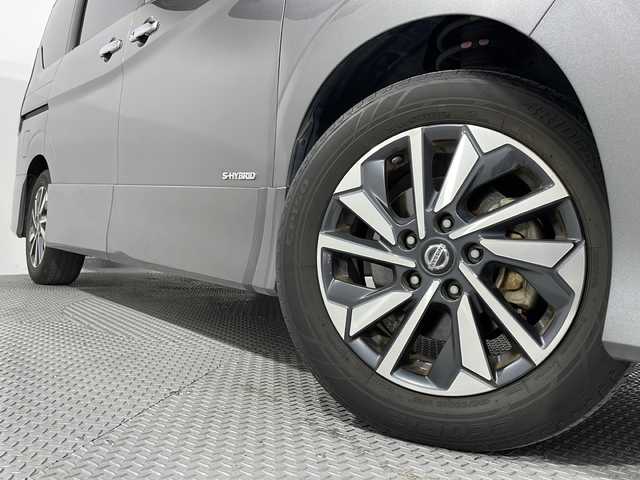 日産 セレナ ハイウェイスター V 広島県 2020(令2)年 2.7万km ダークメタルグレー 純正１０型ナビ/Blu-ray/ホールド機能付電動パーキングブレーキ/後席フリップダウンモニター/パーキングアシスト/プロパイロット/両側パワースライドドア(ハンズフリー機能付)/ブラインドスポットモニター/オートマチックハイビーム/コーナーセンサー/ドラレコ/ＥＴＣ/フォグランプ/衝突軽減/レーンキープ/踏み間違い防止/純正１６インチアルミホイール(185/60/R16)/エアバッグ(運転席/助手席/サイド/カーテン)