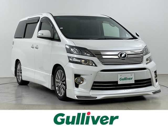 トヨタ ヴェルファイア 2．4Z ゴールデンアイズ 道央・札幌 2013(平25)年 4.7万km ホワイトパールクリスタルシャイン ・４WD/・ALPINEナビ（VIE-X009）/・Bluetooth/CD/DVD/・SD/フルセグTV/・バックカメラ/・両側パワースライドドア/・パワーバックドア/・フロントスポイラー/・ハーフレザーシート/オットマンシート/・オートライト/HIDライト/・ローダウン(社外車高調）/・クリアランスソナー/・ビルトインETC/・スマートキー/スペアキー１本/・プッシュスタート/・MTモード付AT/・横滑り防止装置/・ABS