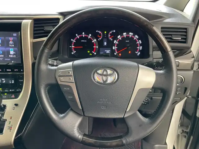 トヨタ ヴェルファイア 2．4Z ゴールデンアイズ 道央・札幌 2013(平25)年 4.7万km ホワイトパールクリスタルシャイン ・４WD/・ALPINEナビ（VIE-X009）/・Bluetooth/CD/DVD/・SD/フルセグTV/・バックカメラ/・両側パワースライドドア/・パワーバックドア/・フロントスポイラー/・ハーフレザーシート/オットマンシート/・オートライト/HIDライト/・ローダウン(社外車高調）/・クリアランスソナー/・ビルトインETC/・スマートキー/スペアキー１本/・プッシュスタート/・MTモード付AT/・横滑り防止装置/・ABS
