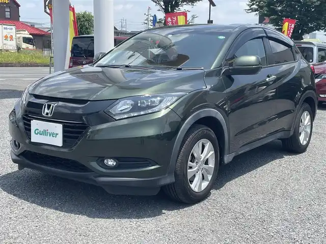 ホンダ ヴェゼル 埼玉県 2017(平29)年 2.8万km ミスティックグリーンパール ワンオーナー/純正ＳＤナビ＆フルセグＴＶ/（ＤＶＤ＆ＣＤ＆ＳＤ＆ＭＳＶ＆ＵＳＢ＆ＢＴ）/バックカメラ/ビルトインＥＴＣ/前後ドライブレコーダー/衝突被害軽減ブレーキ/レーンキープアシスト/標識認識機能/先行車発進通知/レーダークルーズコントロール/革巻ステアリング/ステアリングリモコン/純正１６inアルミホイール/オートライト/ＬＥＤライト/フォグランプ/ウィンカーミラー/オート電動格納ミラー/スマートキー/プッシュスタート/Ｗ＆サイド＆カーテンエアバッグ/横滑り防止装置/ＡＢＳ/ドアバイザー/フロアマット/新車保証書/取扱説明書