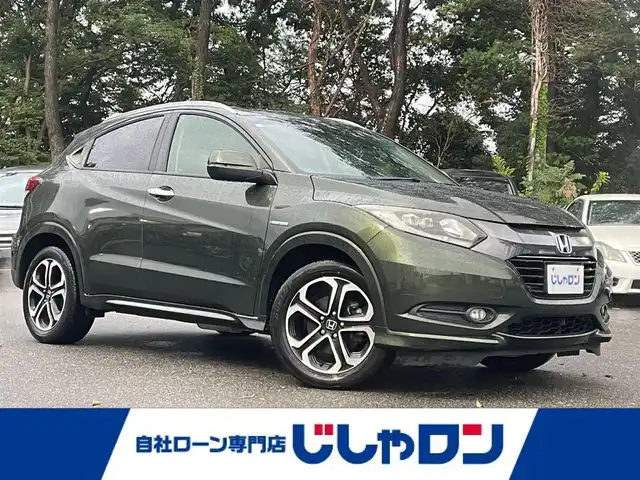 ホンダ ヴェゼル ハイブリッド Z 栃木県 2014(平26)年 14.3万km ミスティックグリーンパール (株)IDOMが運営する【じしゃロン宇都宮店】の自社ローン専用車両になります。こちらは現金またはオートローンご利用時の価格です。自社ローンご希望の方は別途その旨お申付け下さい/社外ナビ/バックカメラ/フルセグ/Ｂｌｕｅｔｏｏｔｈ/ＥＴＣ/クルーズコントロール/パドルシフト/ハーフレザーシート/シートヒーター/ＬＥＤヘッドライト/オートライト/スマートキー