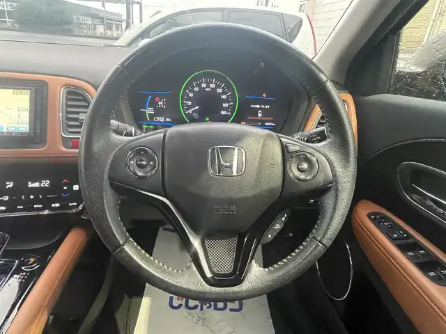 ホンダ ヴェゼル ハイブリッド Z 栃木県 2014(平26)年 14.3万km ミスティックグリーンパール (株)IDOMが運営する【じしゃロン宇都宮店】の自社ローン専用車両になります。こちらは現金またはオートローンご利用時の価格です。自社ローンご希望の方は別途その旨お申付け下さい/社外ナビ/バックカメラ/フルセグ/Ｂｌｕｅｔｏｏｔｈ/ＥＴＣ/クルーズコントロール/パドルシフト/ハーフレザーシート/シートヒーター/ＬＥＤヘッドライト/オートライト/スマートキー