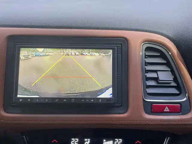 ホンダ ヴェゼル ハイブリッド Z 栃木県 2014(平26)年 14.3万km ミスティックグリーンパール (株)IDOMが運営する【じしゃロン宇都宮店】の自社ローン専用車両になります。こちらは現金またはオートローンご利用時の価格です。自社ローンご希望の方は別途その旨お申付け下さい/社外ナビ/バックカメラ/フルセグ/Ｂｌｕｅｔｏｏｔｈ/ＥＴＣ/クルーズコントロール/パドルシフト/ハーフレザーシート/シートヒーター/ＬＥＤヘッドライト/オートライト/スマートキー