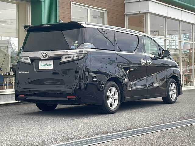 トヨタ ヴェルファイア X 岐阜県 2019(令1)年 3.1万km ブラック 禁煙車/社外9型SDナビ/AM/FM/CD/DVD/BT/HDMI/フルセグTV/バックカメラ/プリクラッシュセーフティ/両側パワースライドドア/LKA/オートライト/オートハイビーム/LEDヘッドライト/フォグランプ/クリアランスソナー /電子パーキングブレーキ/ブレーキホールド/クルーズコントロール/ドライブレコーダー/レザー調シートカバー/スマートキー/プッシュスタート /純正アルミホイール/純正フロアマット/ビルトインETC
